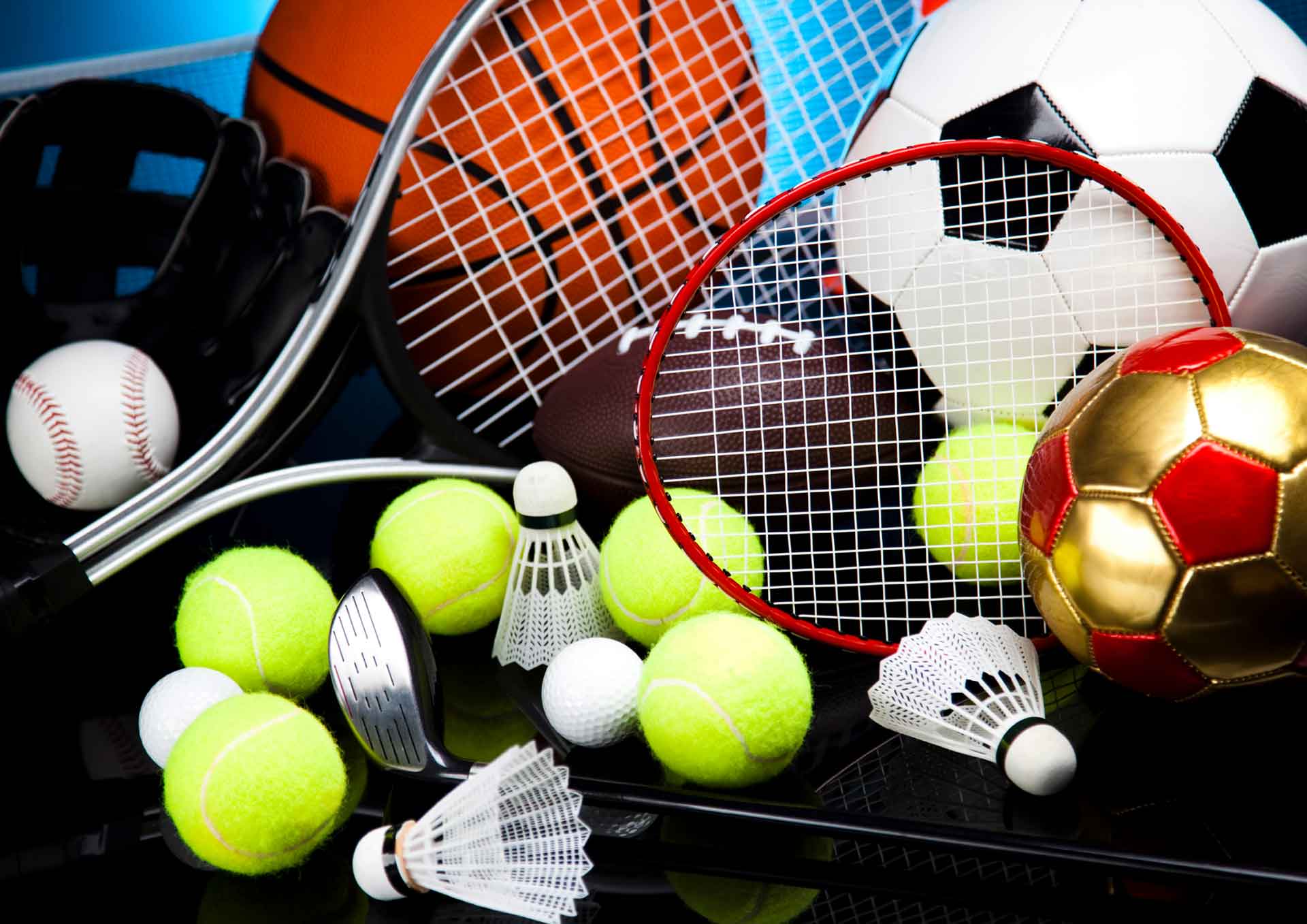 Sports equipment that include tennis balls, racquets, basketball and soccer ball.