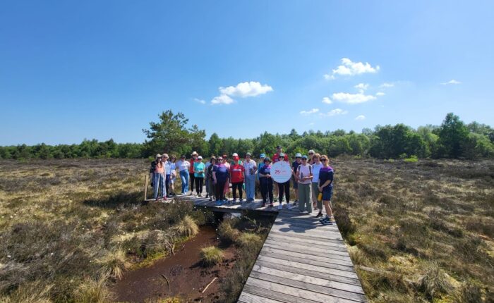 Group photo of social wellness walk at Abbeyleix bog walk with community members, mounthrath walking group & the team with Laois Sports Partnership