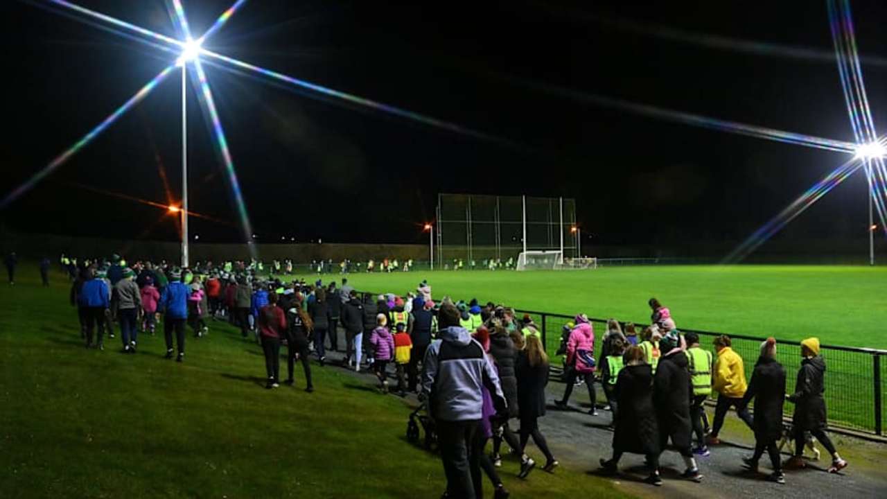 Walking Track Image of a group of people walking on track at a GAA pitch